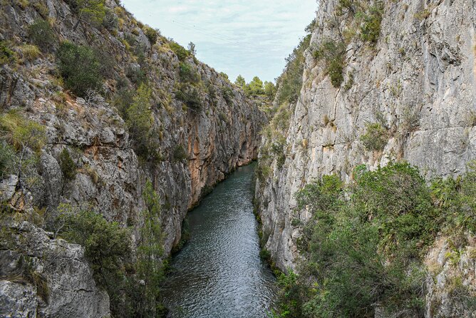 From Valencia: Hiking and Hanging Bridge Adventure in Chulilla - Ruta de Los Calderones, steps, and canyon views