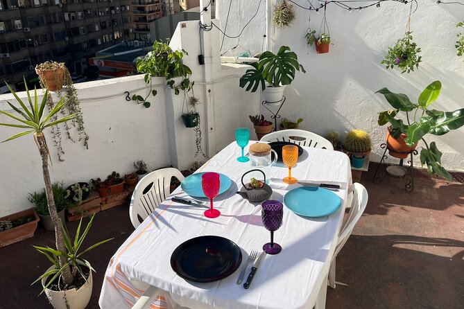 Paella Cooking Class on a Splendid Terrace in Valencia - Learning paella with Leandro and Costanza