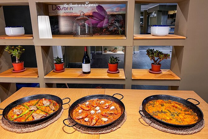 Paella Cooking Class, Wine Tasting & Central Market in Valencia - Tapas, wine, and the long table