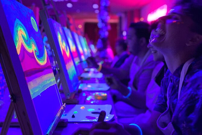 Paint a neon fluorescent picture while drinking unlimited wine - Unlimited wine and a social Valencia plan