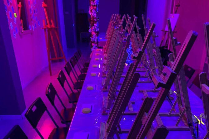 Paint a neon fluorescent picture while drinking unlimited wine - Who will enjoy this activity most