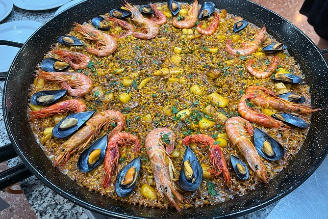 Seafood paella cooking class, tapas and visit to Ruzafa market. - What the $78.64 price really includes
