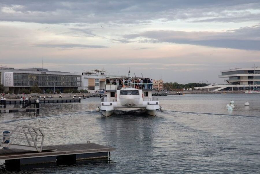 Valencia: Catamaran Cruise, Paella Lunch and Swim Stop - Crew, music, and the mood onboard