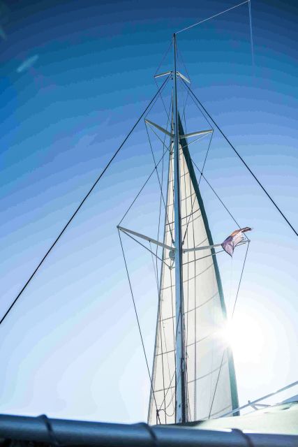 Valencia: Catamaran Cruise with Swimming & Optional DJ - The Optional DJ and Onboard Atmosphere