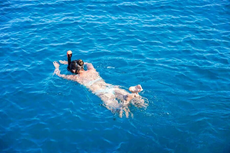Valencia: Catamaran Cruise with Swimming & Optional DJ - Booking, Cancellation, and Timing Tips
