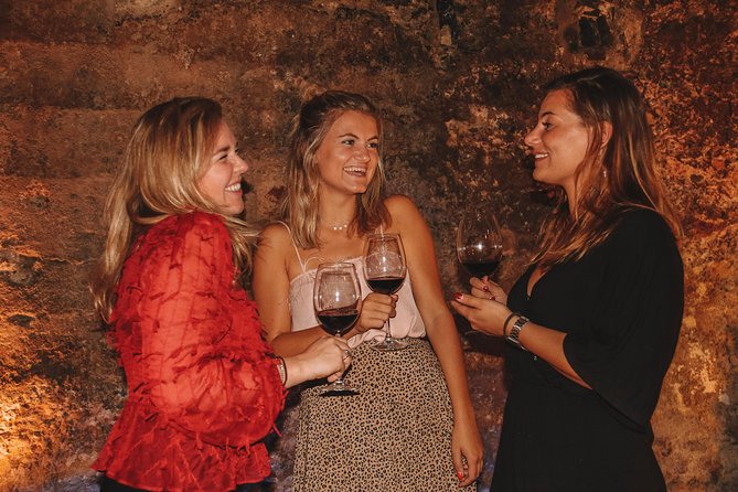 Valencia Old Town Tour with Wine & Tapas in 11th Century Historic Monument - Regional wines and a relaxed social meal