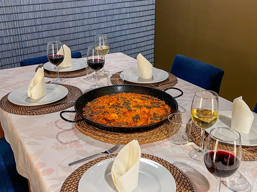 Valencia: Paella Cooking Class with Central Market Tour - Traditional Valencian paella and other versions