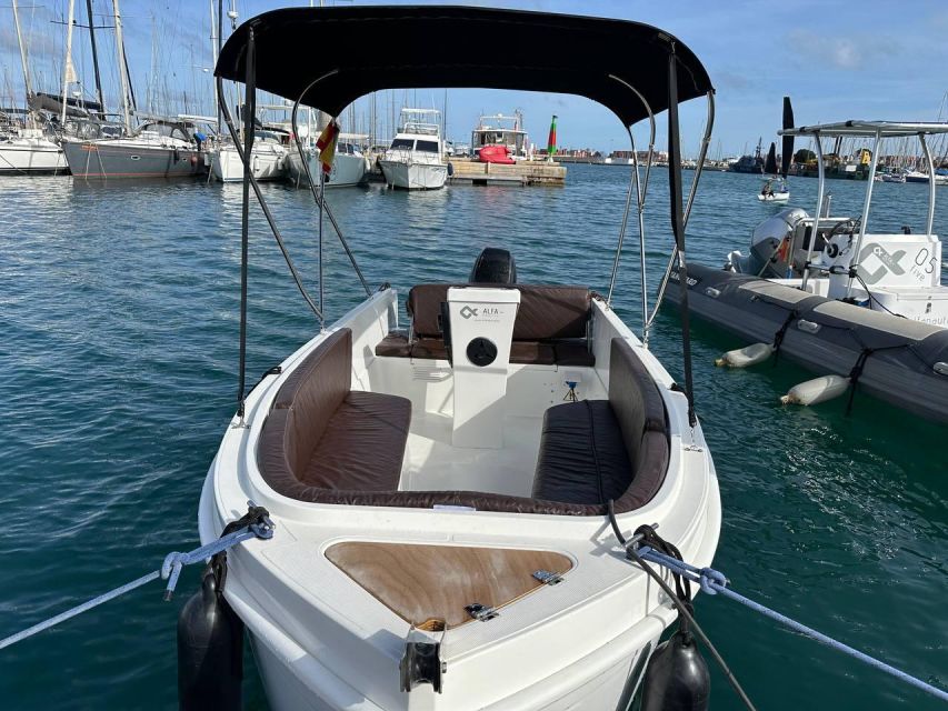 Valencia: Rent Boat Without License - Taking the wheel at Marina Norte