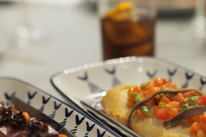 Valencia Tapas Crawl by Food Lover Tour - Stop one: tortilla, jamón, and Valencian cheese