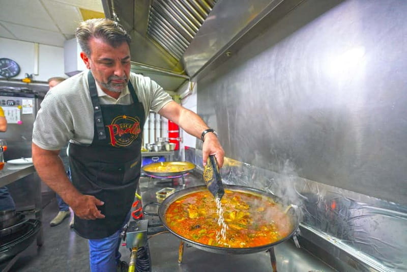 Valencia: Traditional Paella Cooking Class and Dinner - Entering the small Valencian kitchen
