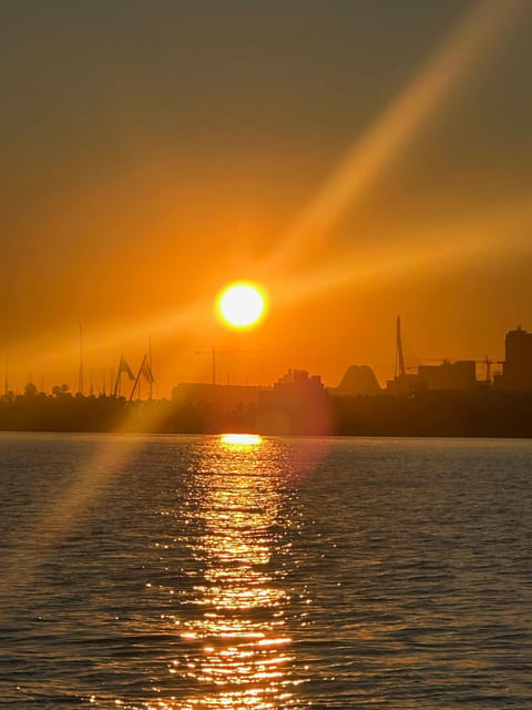 Valencia: VIP Sunset Cruise in Catamaran with drink - Sunset colors, sea air, and lounge music